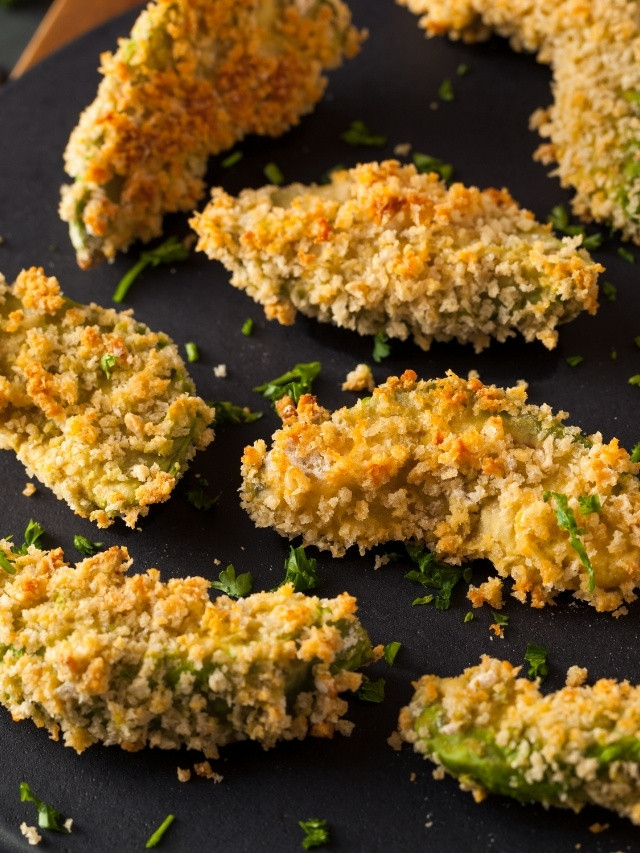 Crispy baked avocado fries on platter