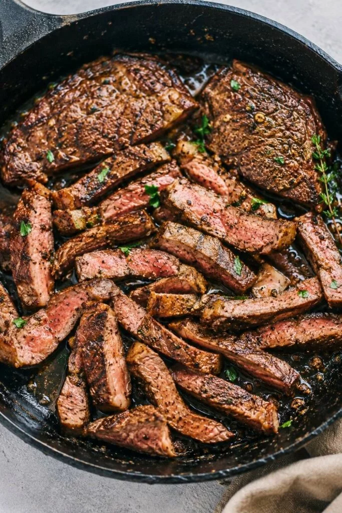 Marinated steaks in the skillet