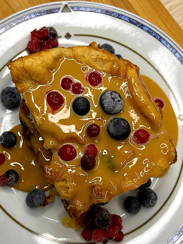 Vanilla-Infused Condensed Milk Sauce on Bread Pudding