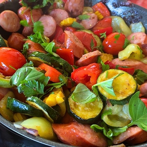 corn kernels and cooked sausage