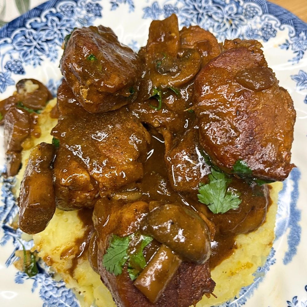 Beer-Braised Pork Medallions with Mushroom Onion Sauce