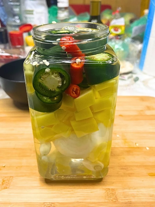 Jar of mango and jalapeno slices