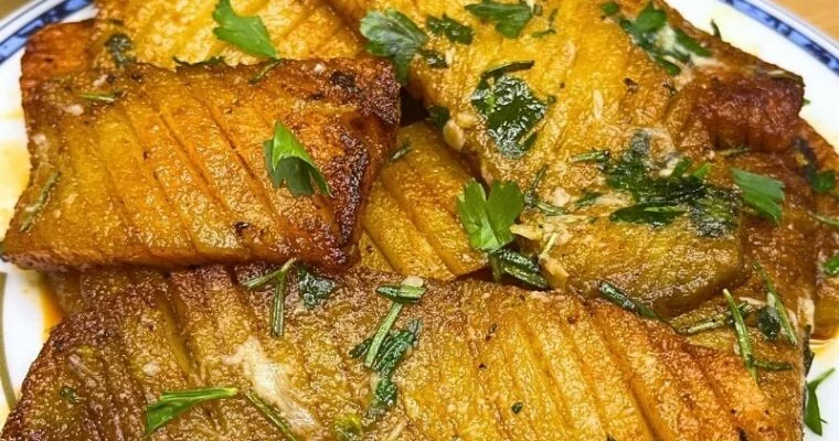 Crispy Accordion Potatoes with Roasted Garlic Butter