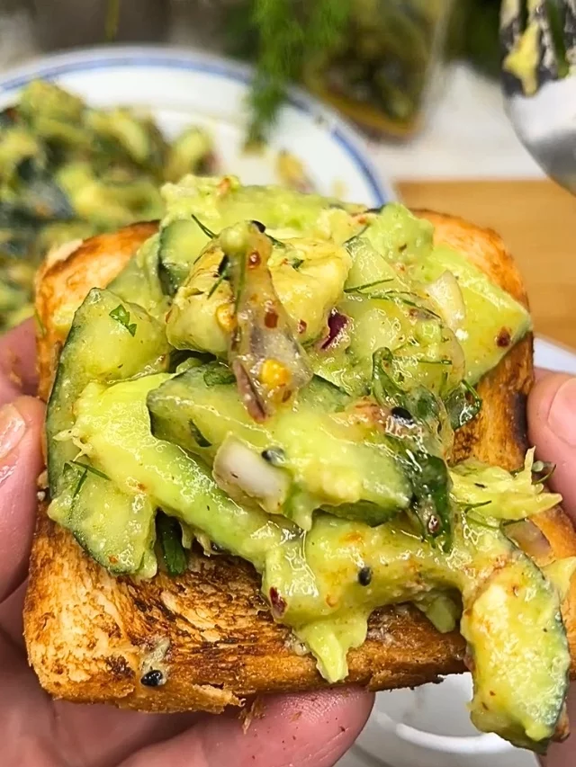 Avocado cucumber salad on toast
