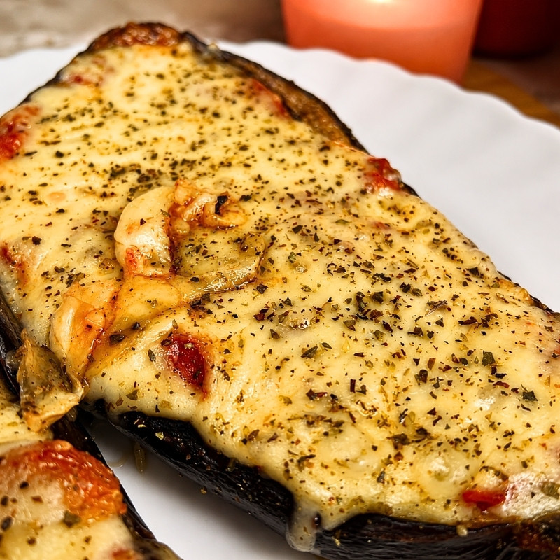 Cheesy Roasted Eggplant Boats With Tomatoes and Garlic
