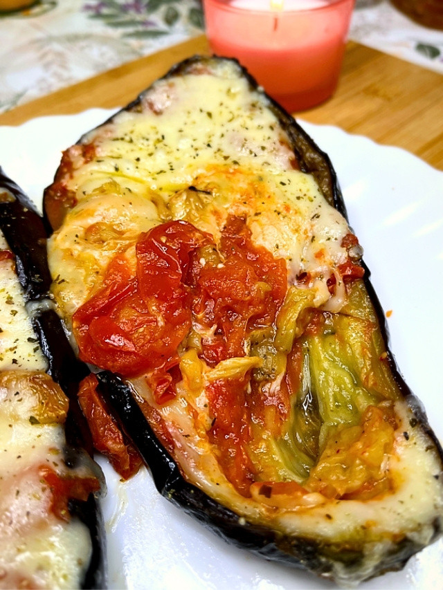 Cheese stuffed Roasted Eggplant Boats With Tomatoes and Garlic