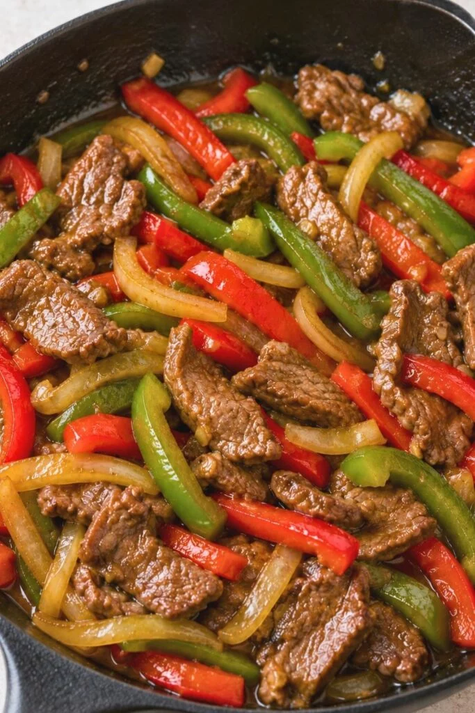 Velveted Pepper Steak in a Skillet